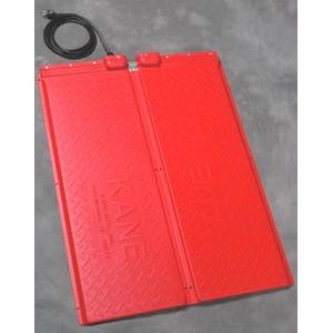 Two red rectangular battery packs with a black cord on a gray surface.