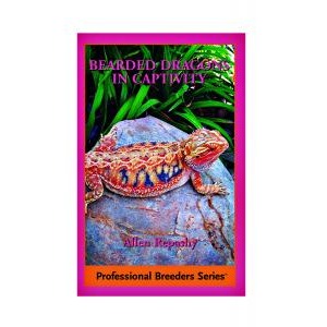 Bearded dragon on a rock with tropical leaves, bold magenta border and orange Professional Breeders Series label.