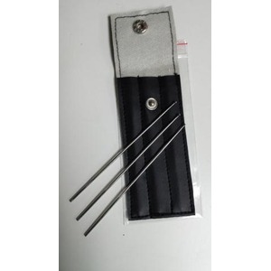 Gray fabric roll with a black padded pocket holding four long thin metal needles and a snap-button closure.