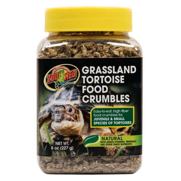 Jar of Grassland Tortoise Food Crumbles with a yellow lid; label features a tortoise and product name.