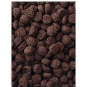Close-up of many small dark brown chocolate-coated cereal balls.