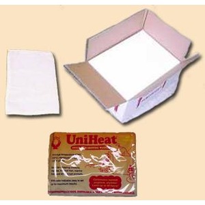 Open cardboard box with pink inner faces, a white rectangular pad to the left, and a UniHeat heating pack in front.