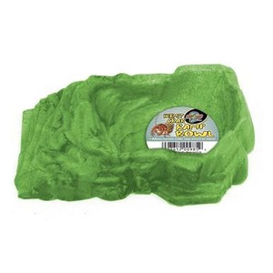 Green crumpled packaging with a circular sticker label on the right.