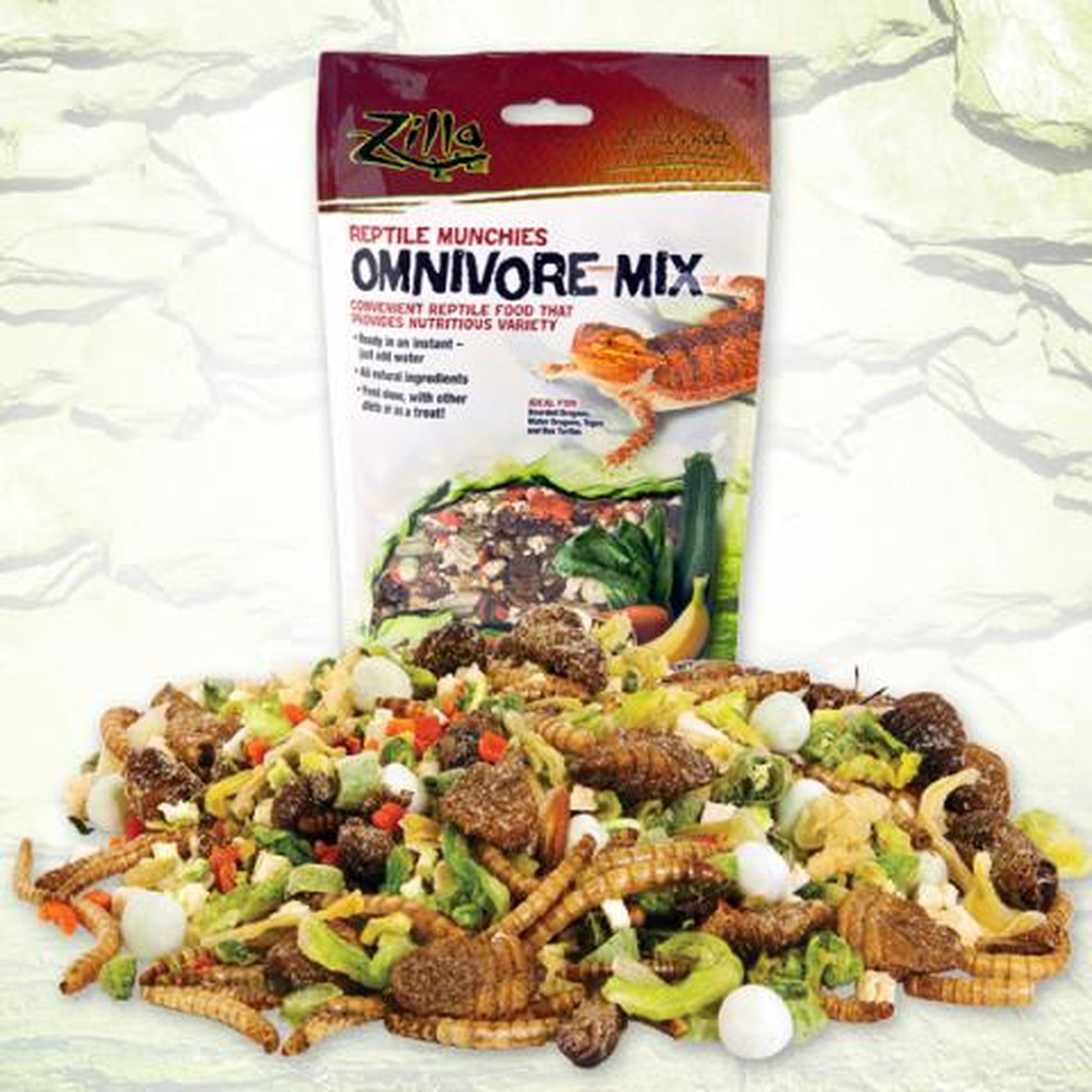 Bag of Zilla Omnivore Mix behind a heap of reptile food with crickets, mealworms, greens and vegetables.