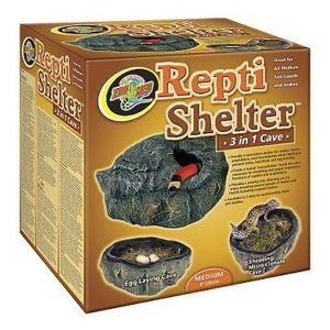 Repti Shelter 3-in-1 Cave packaging showing three hides: egg-laying cave, medium cave, and microclimate cave.