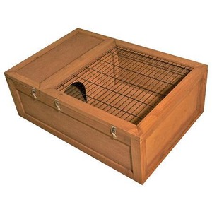 Wooden animal trap with a wire mesh top and side latches.