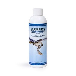 Fluker's Dechlorinator Instant Water Conditioner bottle with bird illustration