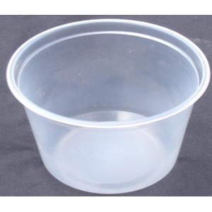 Transparent plastic bowl on a dark surface, empty with a wide circular rim.