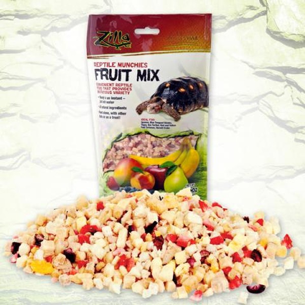 Bag of reptile fruit mix kibble behind a mound of diced fruit-flavored pellets.