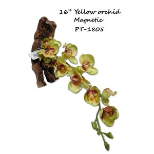 16” Yellow orchid on a piece of driftwood with a long stem.