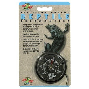 Packaging for Precision Analog Reptile Thermometer with a green lizard and a round black dial thermometer.