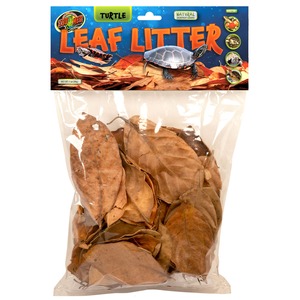 Clear plastic bag of dried brown leaves labeled “Leaf Litter” for turtles, with bright packaging above.