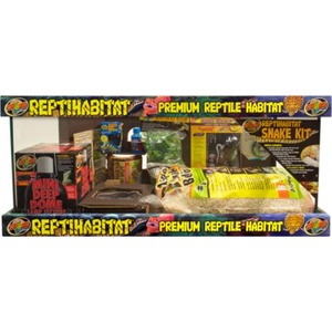 Assorted reptile habitat products and kits on a display shelf labeled Premium Reptile Habitat.
