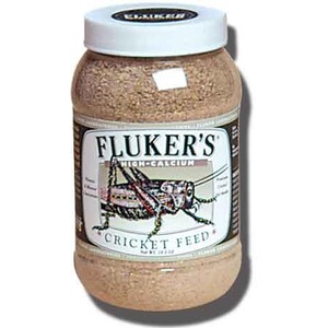 Jar of Fluker's Cricket Feed with white lid, label showing a cricket illustration.