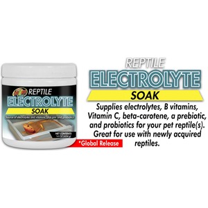 Reptile electrolyte soak jar with blue text, yellow “SOAK” banner, and product description for pets.