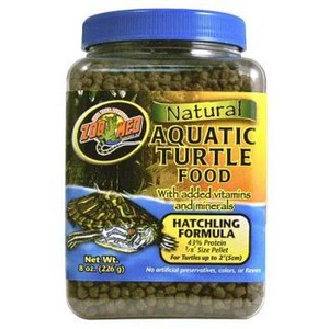 Jar of Natural Aquatic Turtle Food with hatchling formula, blue lid, label shows turtle graphic and pellets.
