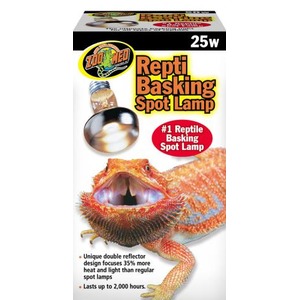 Orange bearded dragon basking under a 25W Zoo Med reptile basking spot lamp on product packaging.