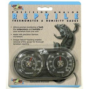 Reptile thermometer and humidity gauge with two dials and a lizard graphic on packaging.