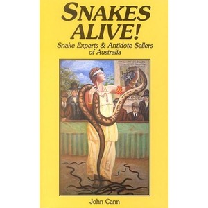Yellow cover SNAKES ALIVE!, a man tangled with a large snake in a ring, spectators in the background.