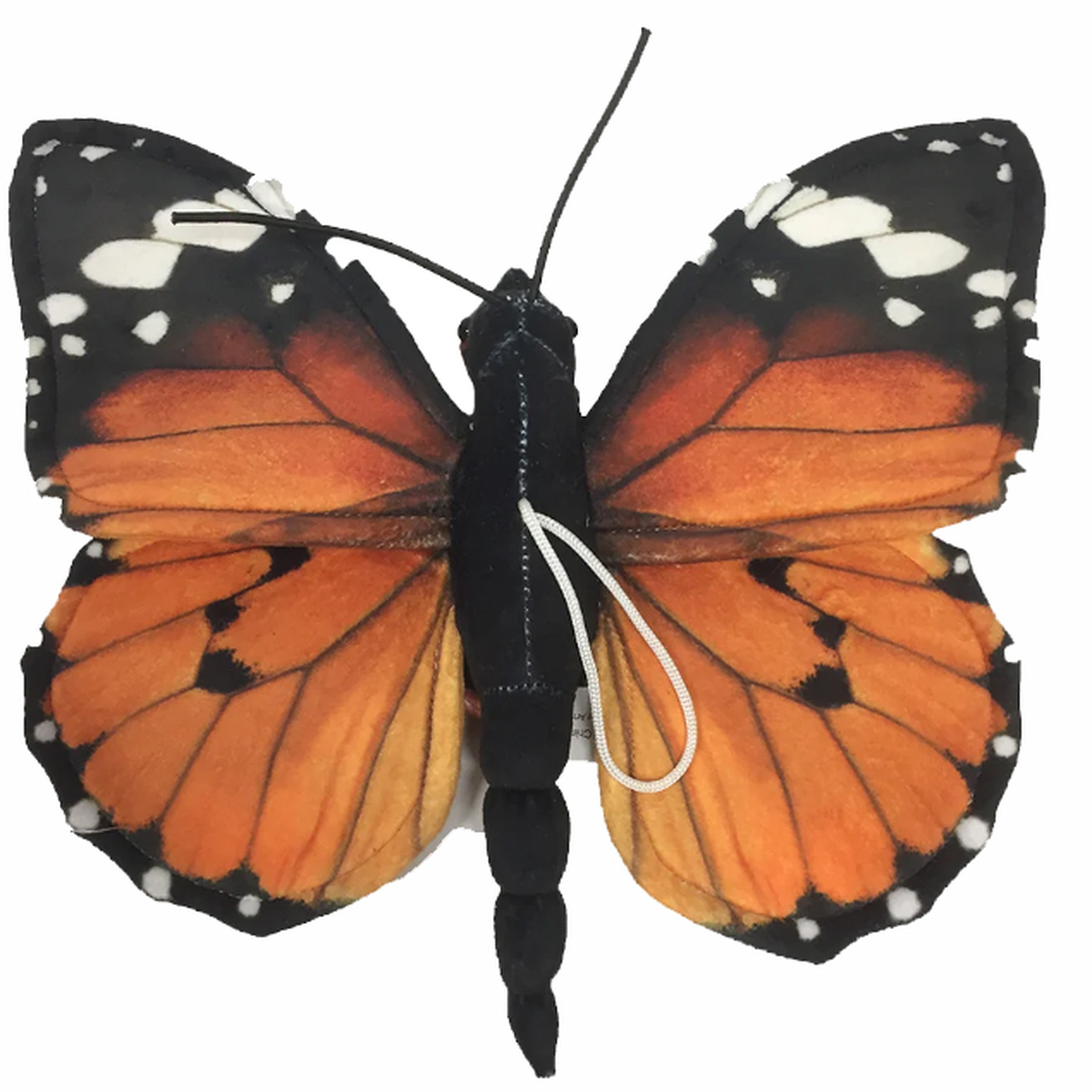 Fabric orange-black butterfly with white spots; string looped around its black body.