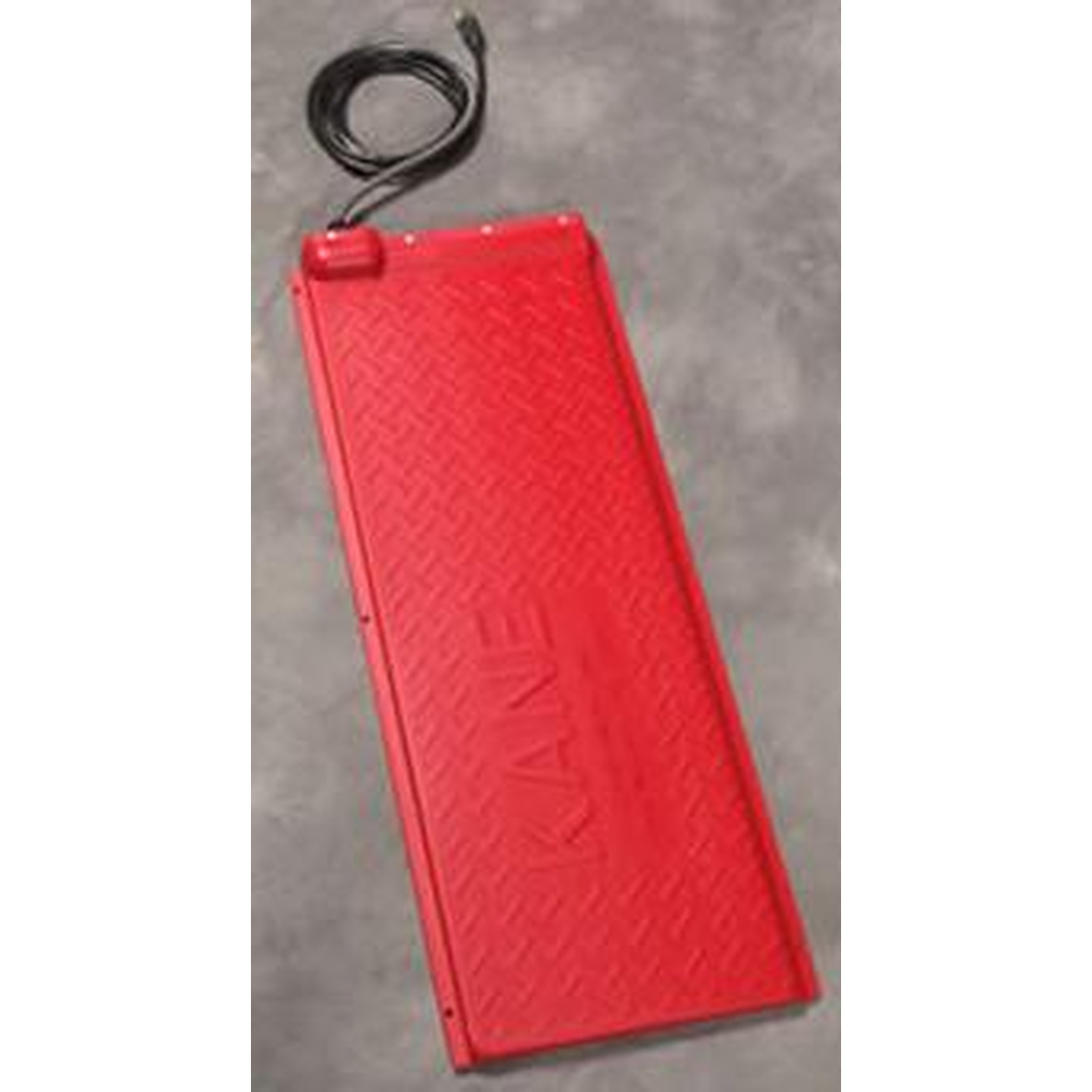 Red power bank with a coiled black USB cable on a gray surface.