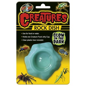 Creatures Rock Dish glow‑in‑the‑dark toy package showing a turquoise jelly cup and insect illustrations.