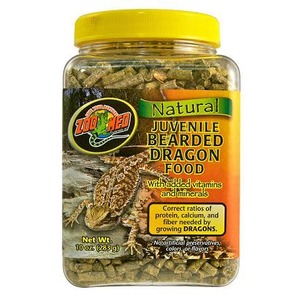 Clear jar with yellow lid containing Zoo Med Natural Juvenile Bearded Dragon Food; label features a bearded dragon.
