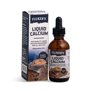 Bottle of Fluker's Liquid Calcium with dropper beside its carton featuring a reptile image.