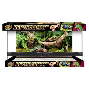 Zoo Med Reptihabitat terrarium with lush plants, driftwood, moss, and glass panels on a black stand.