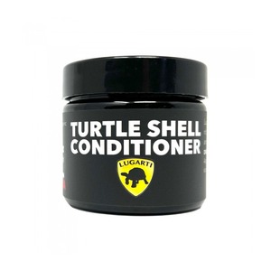 Black jar with bold white text reading Turtle Shell Conditioner and a yellow shield logo with a turtle silhouette.