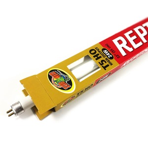 Model rocket engine in a yellow box with red labeling and a circular sticker; window shows the engine inside.