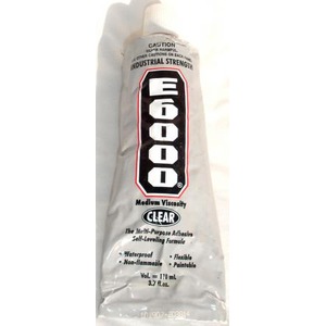 Tube of E6000 industrial strength clear adhesive with a large E6000 logo and notes medium viscosity