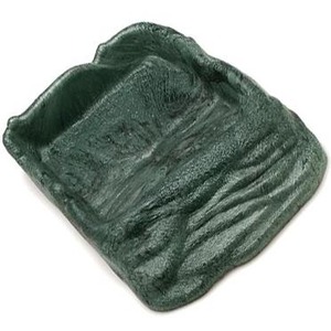 Dark green textured rock-shaped object with deep grooves.