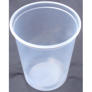 Clear plastic cup empty on a dark surface