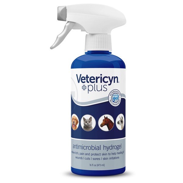 Blue spray bottle labeled Vetericyn Plus antimicrobial hydrogel with dog, cat, horse, and rabbit icons.