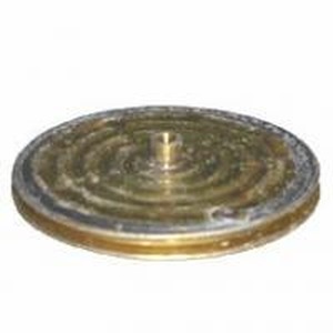 Brass lawn sprinkler head with concentric rings and a central nozzle.