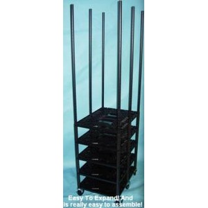 Black multi-tier rack with tall vertical bars and several shelves against a blue background.