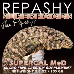 Close-up of a reptile head on a black background with Repashy Superfoods branding and SUPERCAL MeD text.
