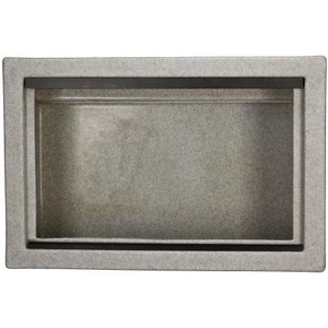 Open metal mail slot recessed in a light gray concrete frame.