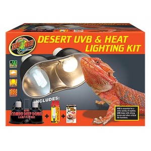 Desert UVB and heat lighting kit box featuring a bearded dragon and a glowing lamp with included components.