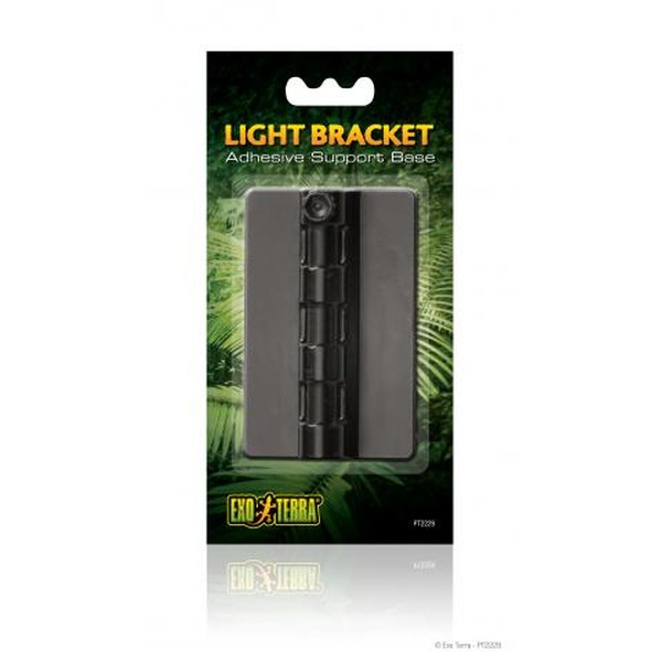 Black adhesive light bracket base with vertical grid on packaging against a green tropical background.