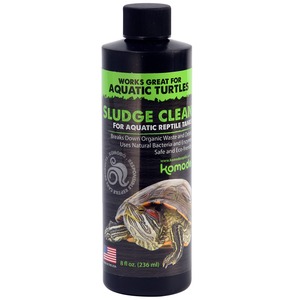 Black bottle with neon green label reading Sludge Clean for aquatic reptiles and a turtle image on the front.