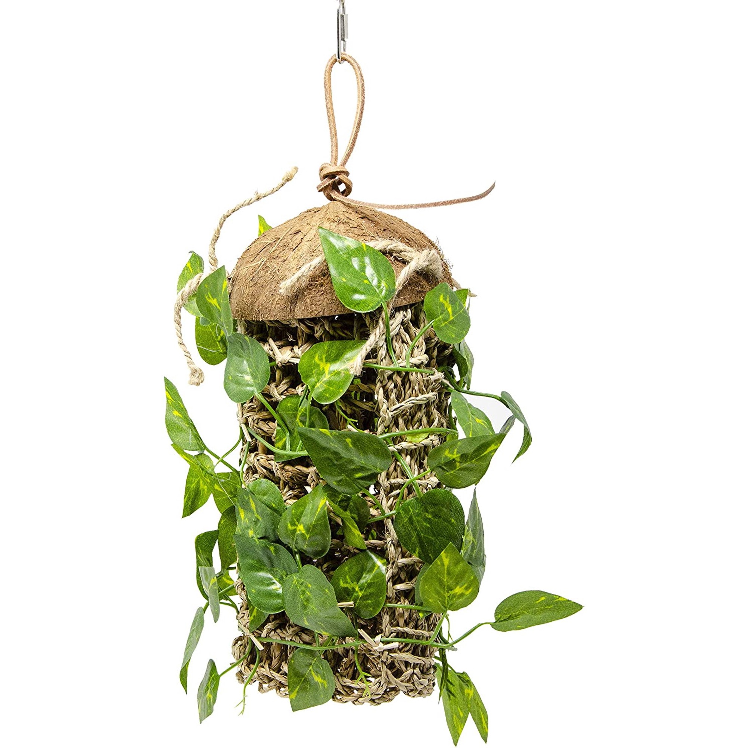 Hanging cylindrical nest made of coconut-fiber and twine, wrapped with trailing green vines.