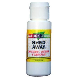 Small white bottle labeled Nature Zone Shed Away moisturizer, softener & lubricant.