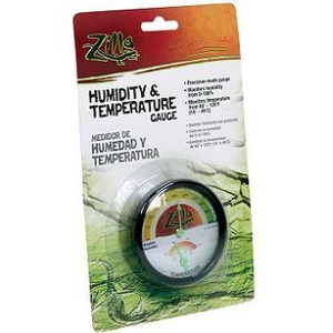 Zilla humidity and temperature gauge in packaging with a circular dial on a green, white blister card.