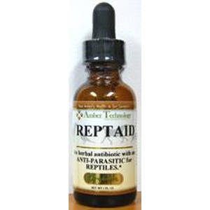 Amber glass dropper bottle labeled REPTAID herbal anti-parasitic for reptiles.