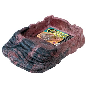 Purple and black textured rock-shaped dish with a product label inside.