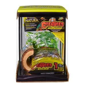 Creatures creature habitat kit in a bright yellow box with soil bag, green plant, and plant accessories inside.