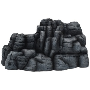 Dark gray volcanic rock formation with tall column-like blocks and rugged surfaces