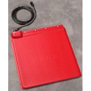 Red square electronic device with a textured surface and a coiled black cable beside it.